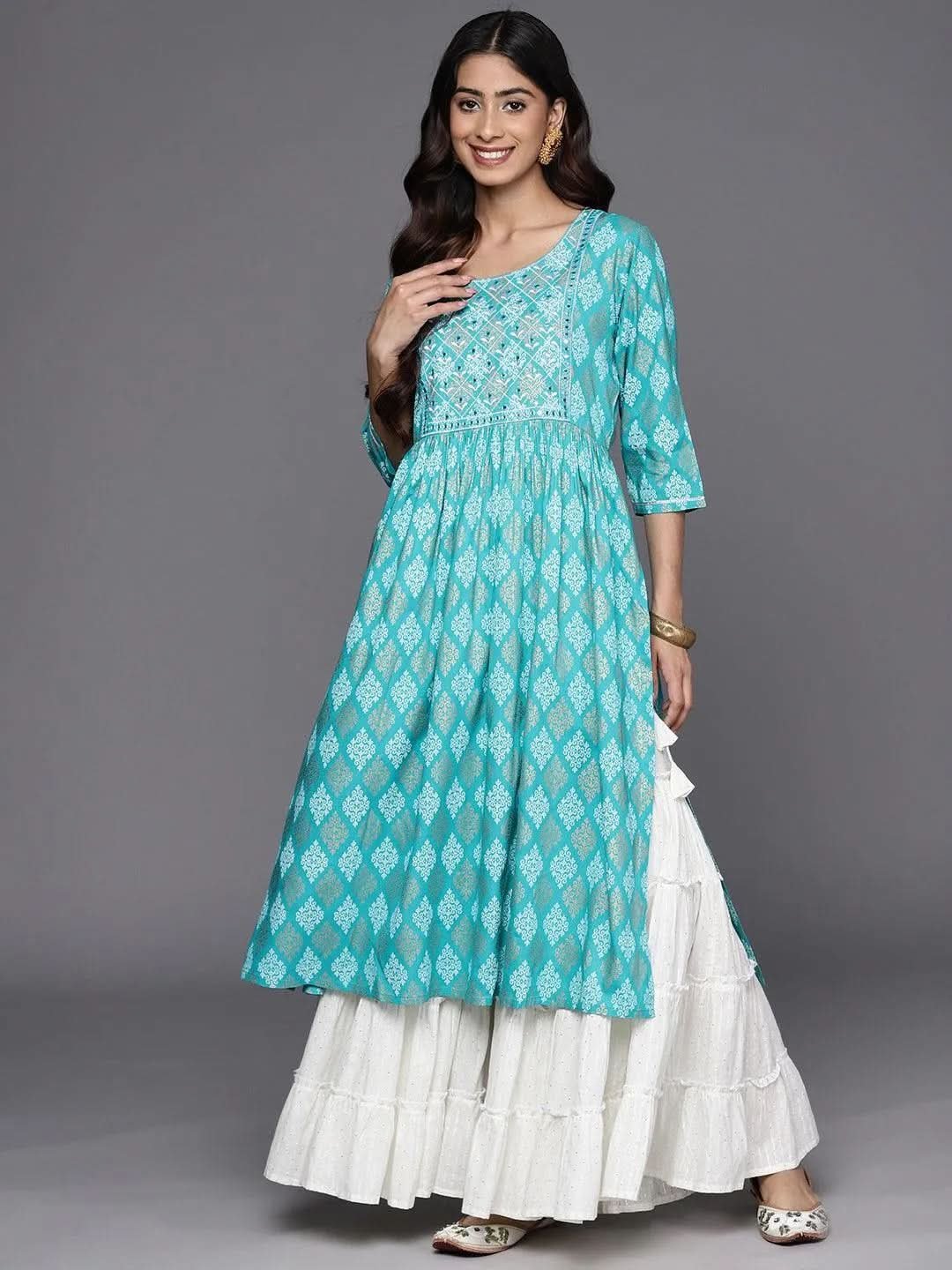 turquoise-blue-embellished-rayon-a-line-kurta-libas-1.jpg Turquoise Blue Embellished Rayon A-Line Kurta - Image 1